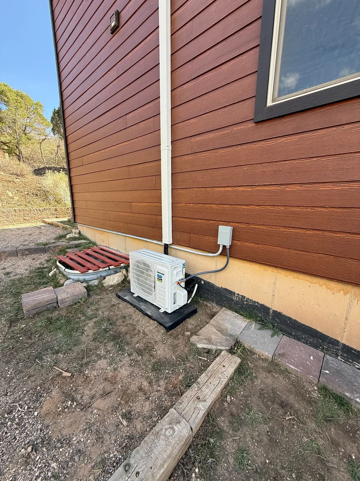AC condenser installed beside a home in St. George, UT