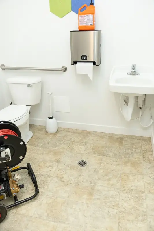 Drain machine set up in a restroom in St. George, UT
