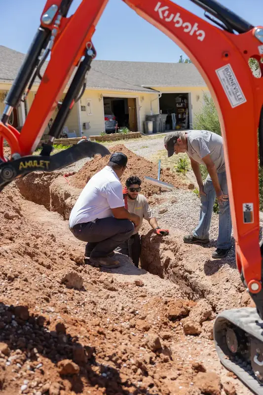 Element crew repairing a buried pipe in St. George, UT