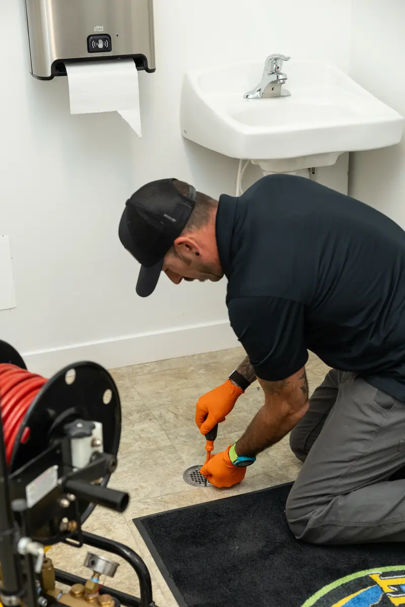 Element plumber snaking a floor drain in St. George, UT