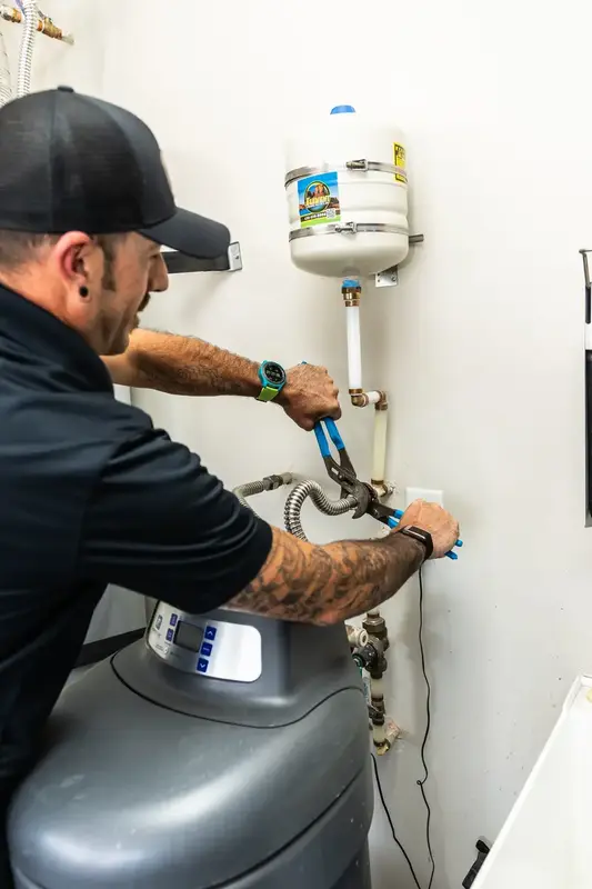 Element technician installing a water softener in St. George, UT