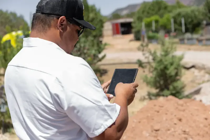 Element technician reviewing a job on a tablet in St. George, UT