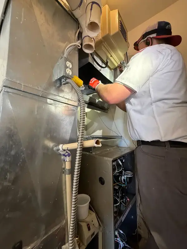 Element technician wiring HVAC equipment in St. George, UT