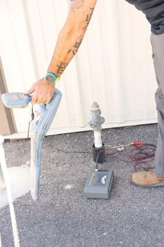 Pipe locator wand scanning for a leak in St. George, UT
